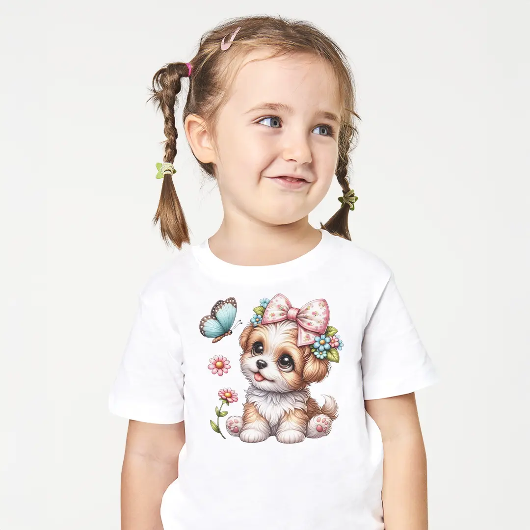 Sevimli-Kopek-Yavrusu-Kiz-Cocuk-Tisort-–-Fiyonklu-Kelebek-Cicekli-Puppy-Baskili-Beyaz-T-Shirt.webp Sevimli Köpek Yavrusu Kız Çocuk Tişört - Görsel 1